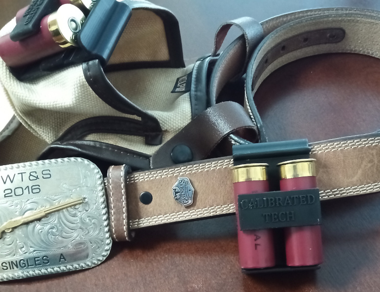 12 gauge dual spare shell holder clipped onto a belt